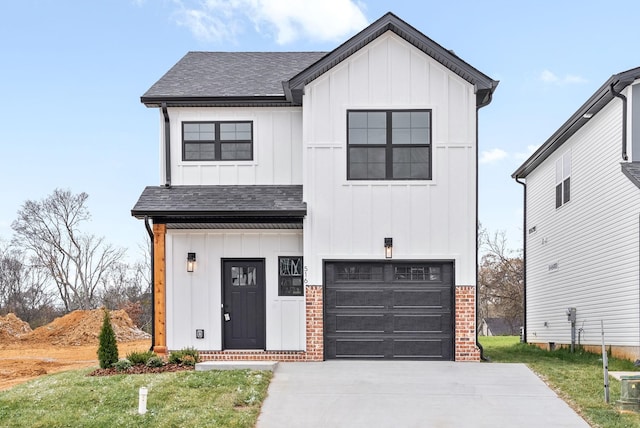 modern farmhouse featuring a garage