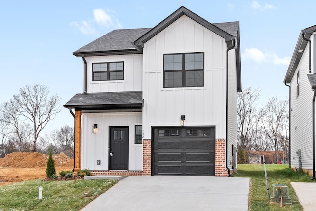 modern farmhouse style home featuring a front lawn and a garage