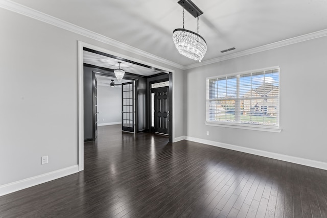 unfurnished room featuring ornamental molding, dark hardwood / wood-style flooring, and ceiling fan with notable chandelier