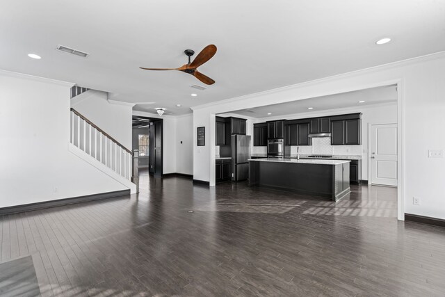 unfurnished living room with ornamental molding, dark hardwood / wood-style floors, and ceiling fan