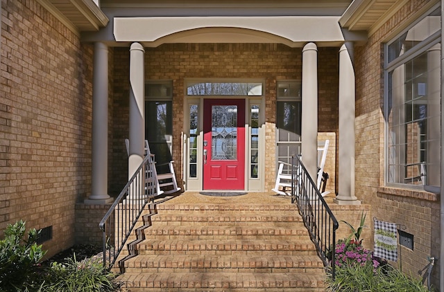 property entrance with covered porch