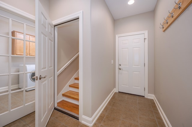 doorway to outside with washer / dryer