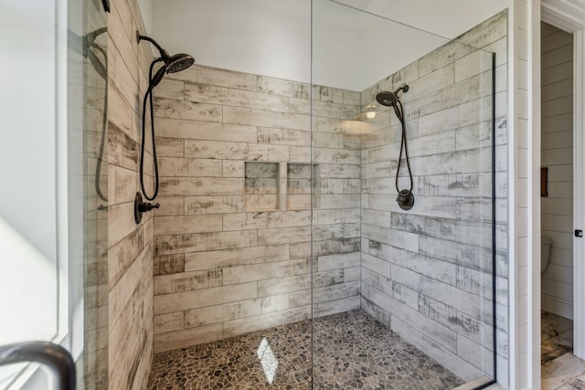 bathroom featuring an enclosed shower