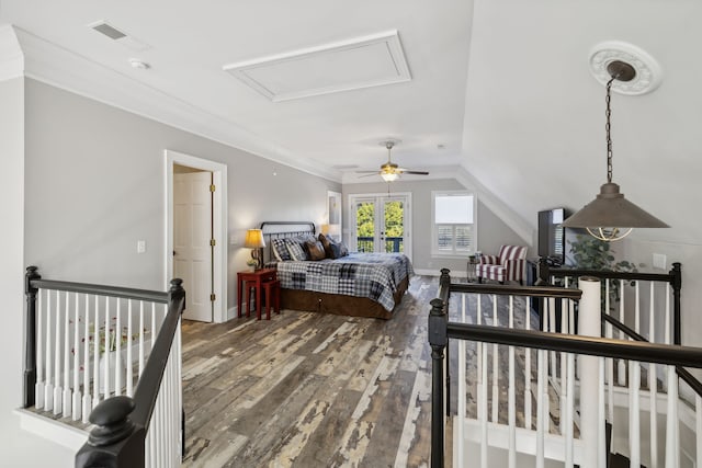 bedroom featuring ornamental molding, vaulted ceiling, dark hardwood / wood-style floors, and ceiling fan