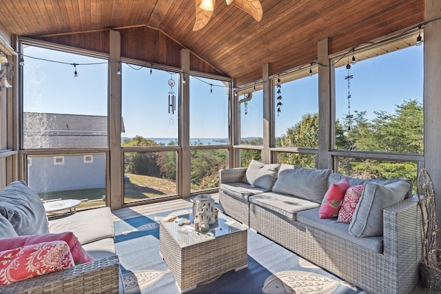 sunroom with wood ceiling, vaulted ceiling, and ceiling fan