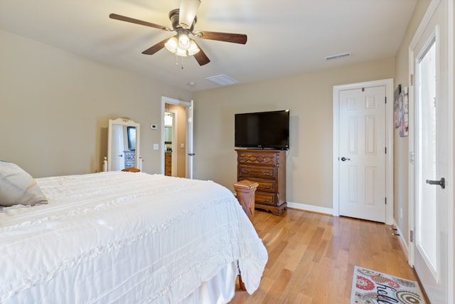 bedroom with light wood-type flooring and ceiling fan