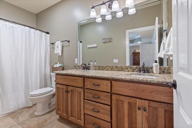 bathroom featuring toilet, curtained shower, vanity, and tile patterned flooring