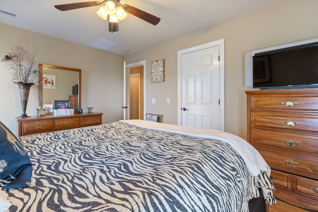 bedroom featuring ceiling fan