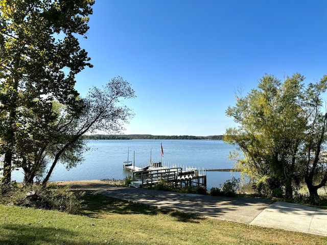 dock area with a water view