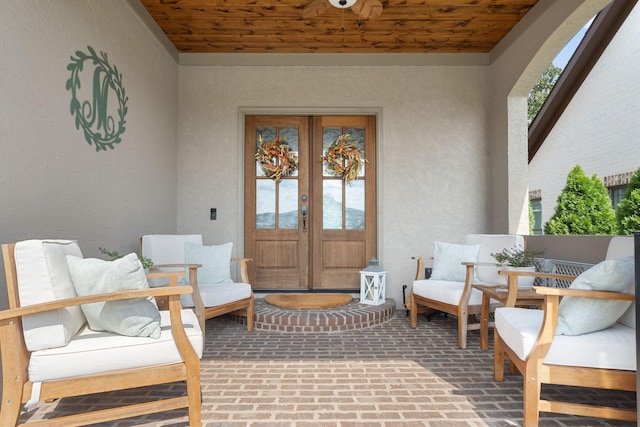 property entrance featuring french doors