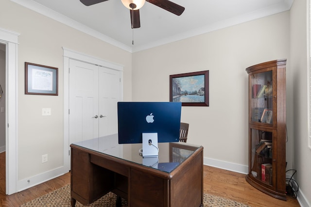 office area featuring crown molding, wood-type flooring, and ceiling fan