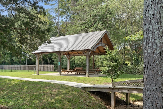 view of property's community featuring a gazebo and a lawn