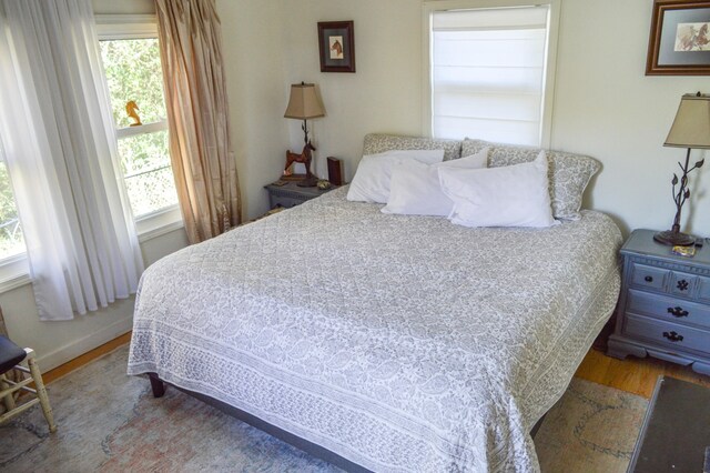 bedroom featuring hardwood / wood-style floors