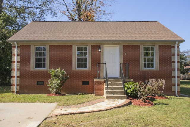 view of front of home featuring a front lawn