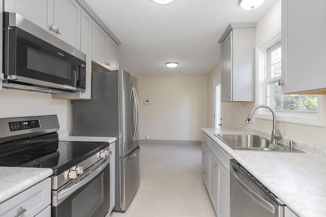 kitchen with appliances with stainless steel finishes and sink