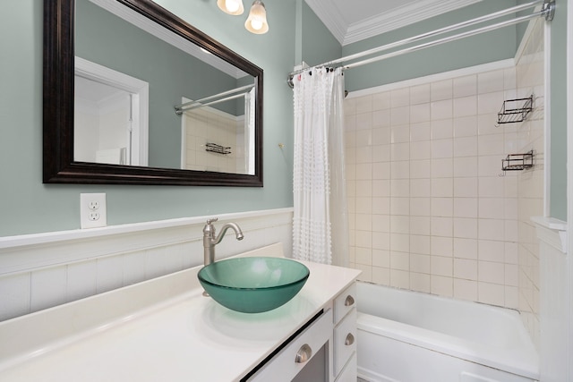 bathroom with vanity, shower / bath combo with shower curtain, and ornamental molding