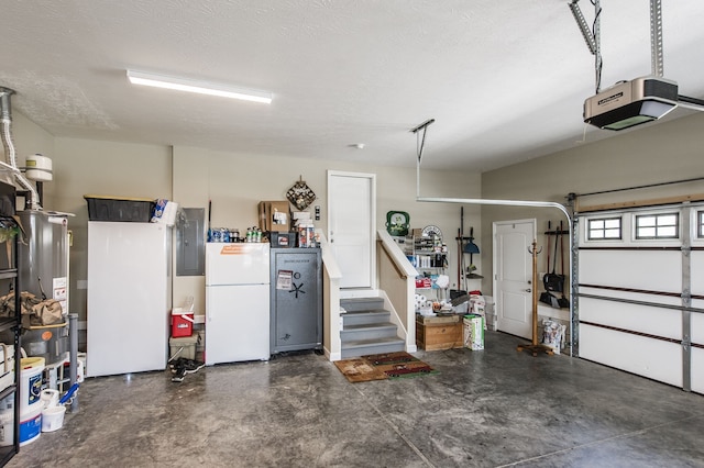 garage with white fridge, a garage door opener, and electric panel