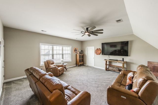 living room with lofted ceiling, carpet flooring, and ceiling fan