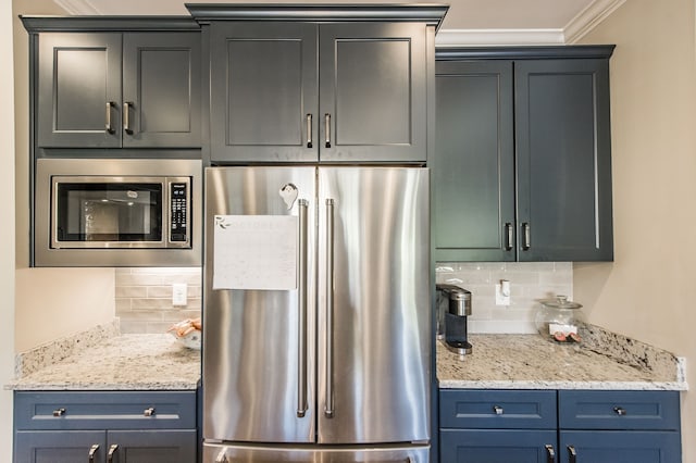 kitchen featuring crown molding, tasteful backsplash, stainless steel appliances, and light stone counters