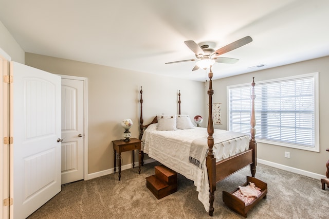 carpeted bedroom featuring ceiling fan