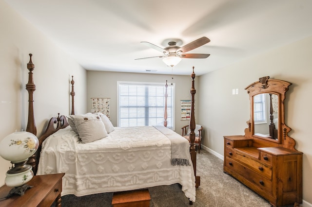 bedroom with light colored carpet and ceiling fan