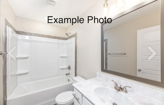 full bathroom with vanity, toilet, and washtub / shower combination