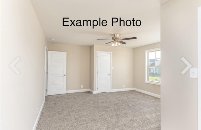 unfurnished room featuring ceiling fan and light carpet