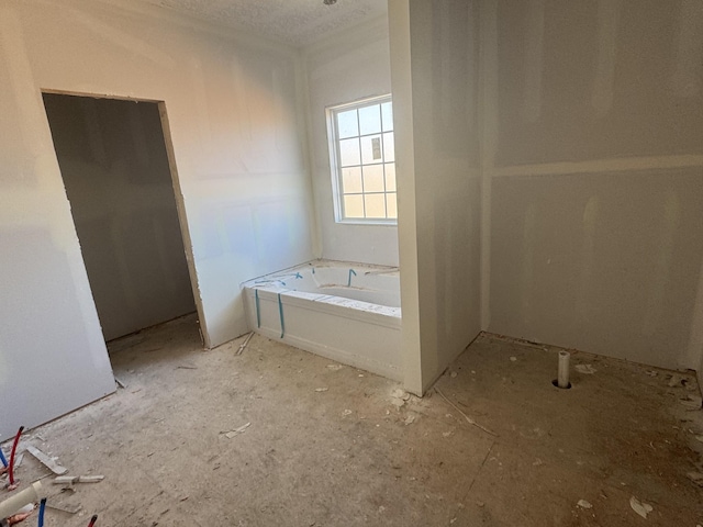 bathroom featuring a garden tub