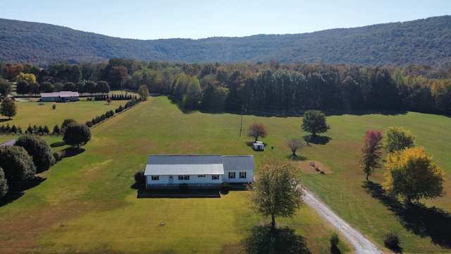 drone / aerial view featuring a mountain view and a rural view