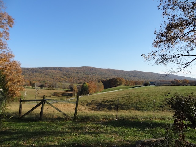 property view of mountains featuring a rural view