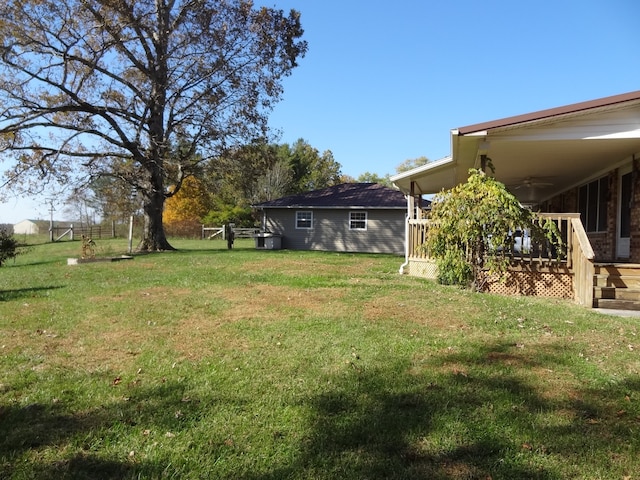 view of yard with a deck