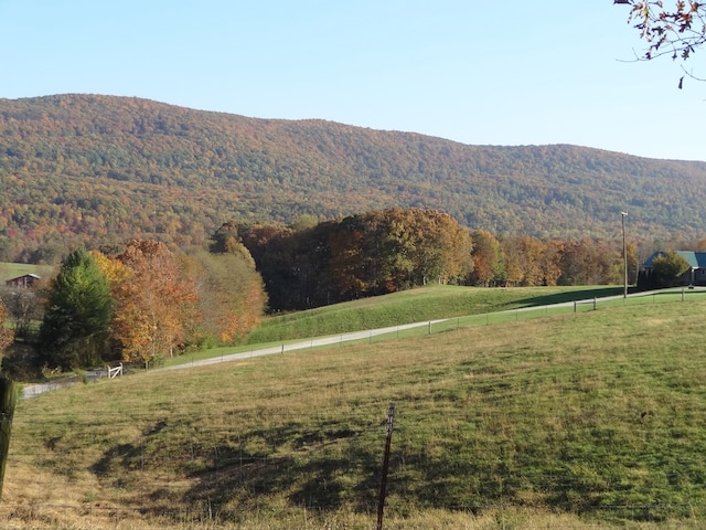 view of mountain feature with a rural view