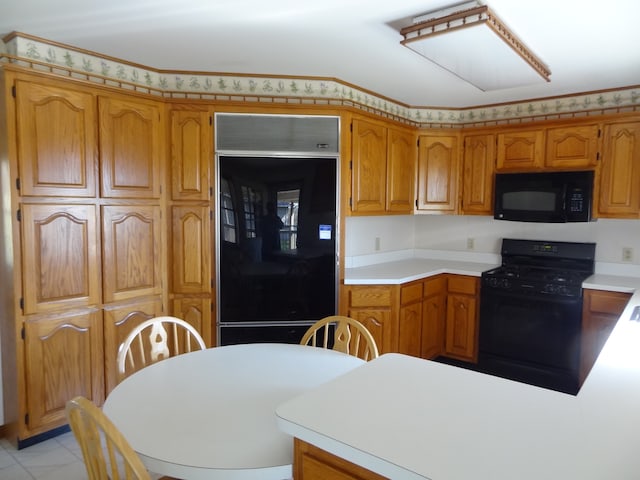 kitchen with black appliances