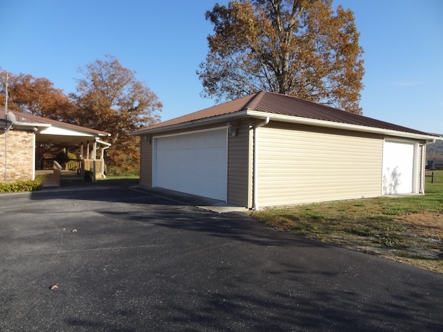 garage with a carport