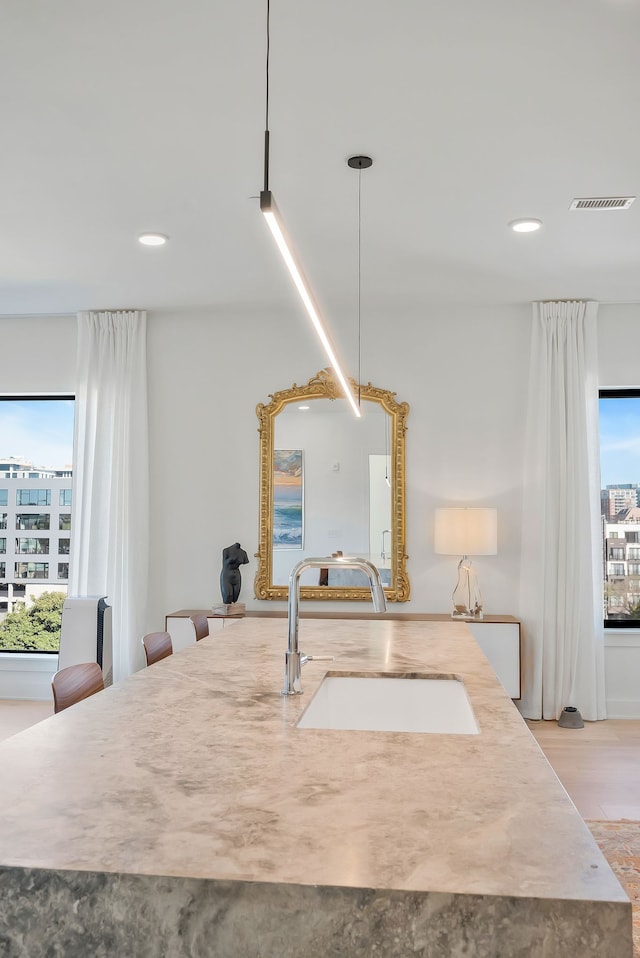 details with pendant lighting and sink