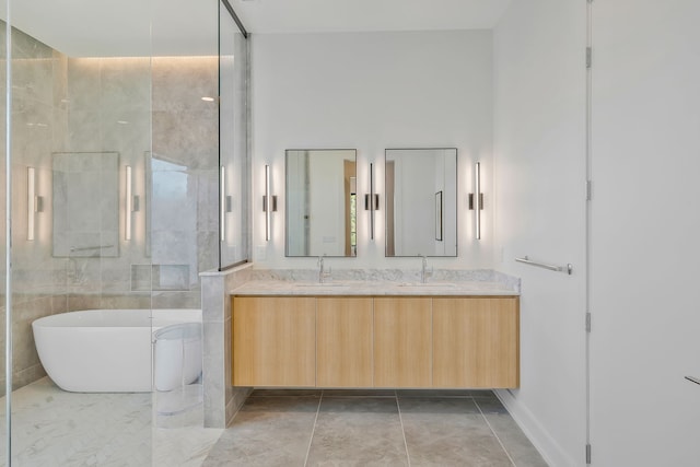 bathroom with plus walk in shower, vanity, tile patterned floors, and tile walls