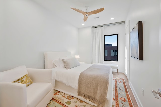 bedroom featuring ceiling fan and light wood-type flooring