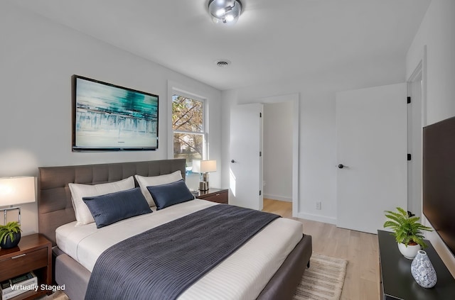 bedroom featuring light hardwood / wood-style flooring