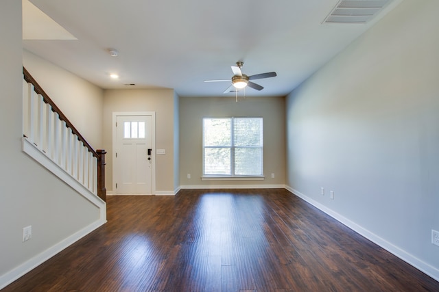 foyer entrance featuring ceiling fan and dark hardwood / wood-style floors