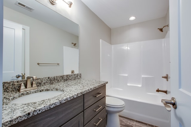 full bathroom featuring vanity, toilet, and shower / bathtub combination