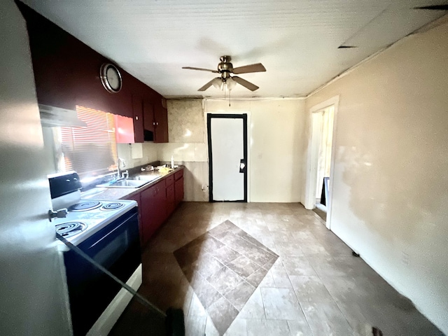 kitchen with range hood, stainless steel fridge, sink, white range with electric stovetop, and ceiling fan