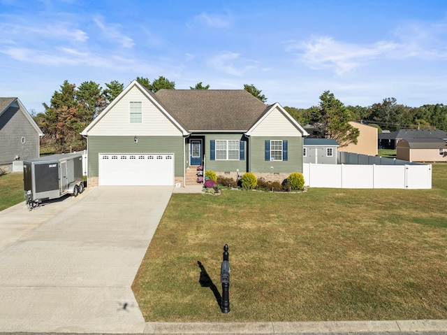 view of front of home with a front lawn and a garage