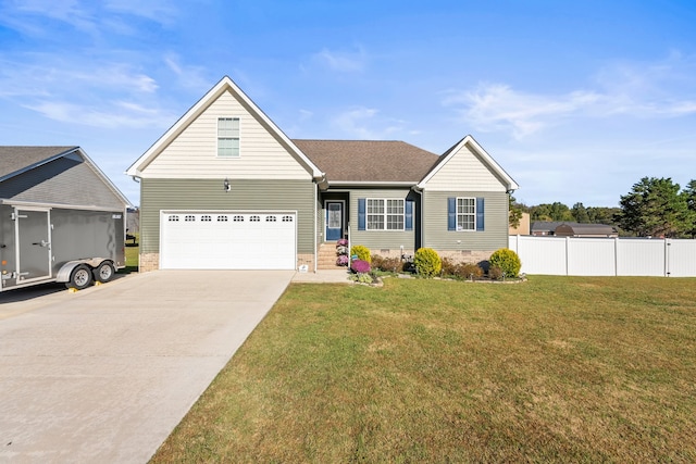 view of front facade with a front lawn and a garage