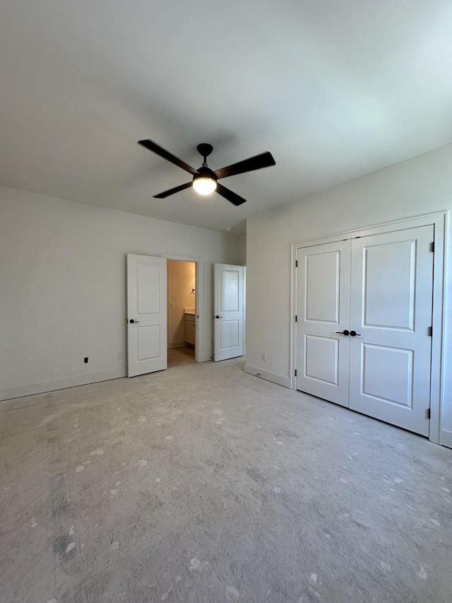 unfurnished bedroom with a closet, a ceiling fan, and baseboards