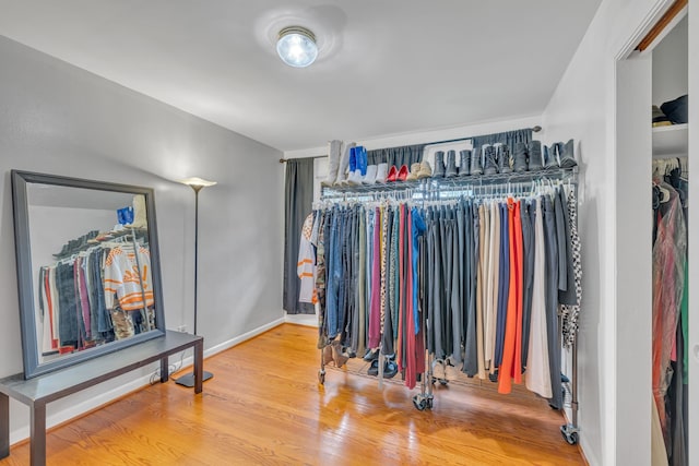 spacious closet featuring hardwood / wood-style floors