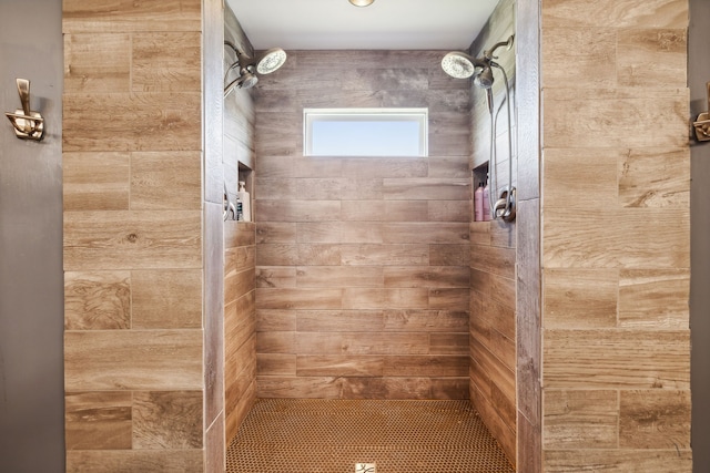 bathroom featuring tiled shower