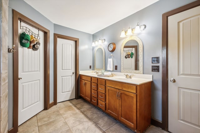 bathroom with vanity and tile patterned flooring