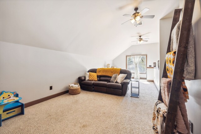 carpeted living room with lofted ceiling and ceiling fan