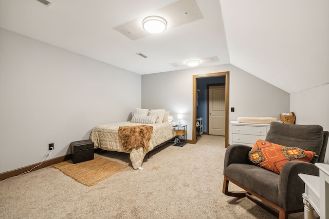 carpeted bedroom featuring lofted ceiling