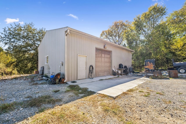 view of outbuilding featuring a garage